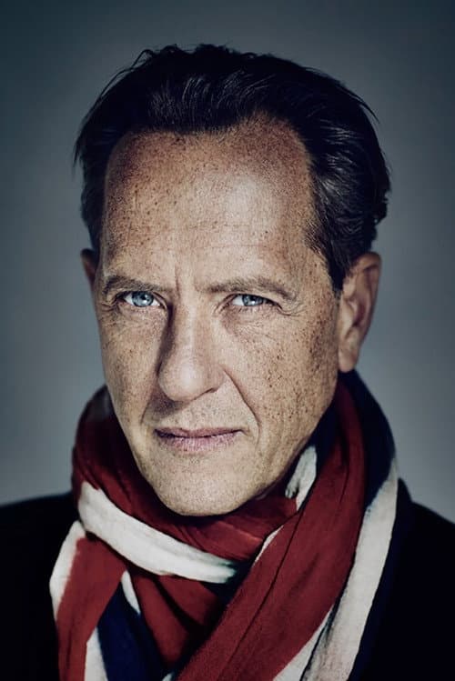 Richard E. Grant as Hugo Guiler in Henry & June