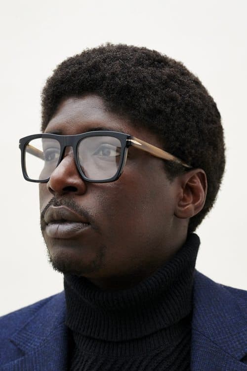 Alassane Sy as Abas in Mediterranea