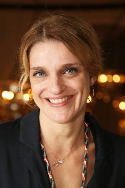 Olivia CΓ΄te as Blandine Bouvier in Two Tickets to Greece