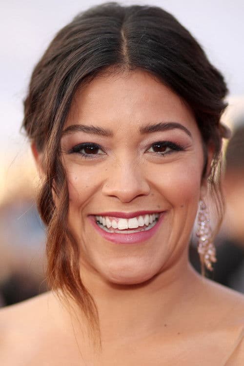 Gina Rodriguez as Melanie in Kajillionaire