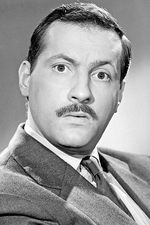 Michel Serrault as Le comptable in Buffet Froid