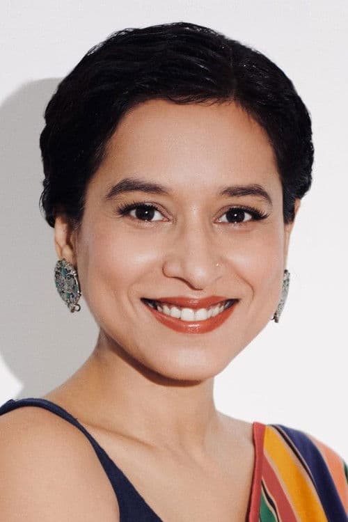 Tillotama Shome as Madhura Banerjee in Ikka