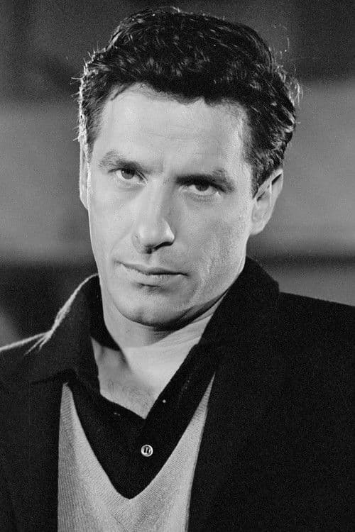 John Cassavetes as Hank McCain in Machine Gun McCain