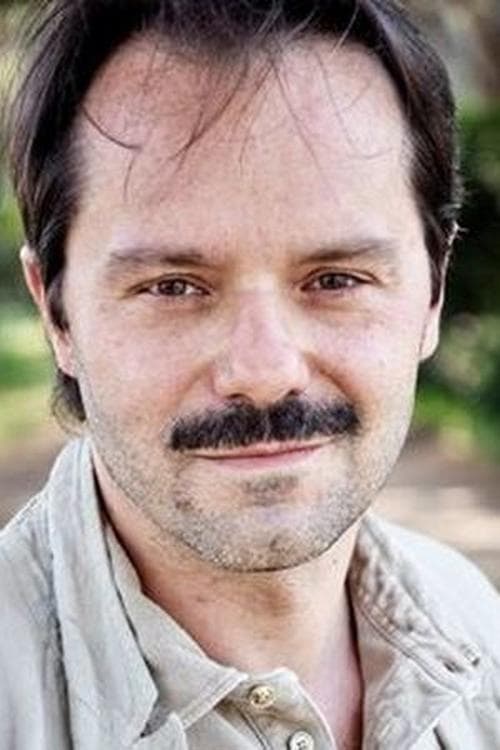 Sergio Romano as Carlobianchi in The Last One for the Road