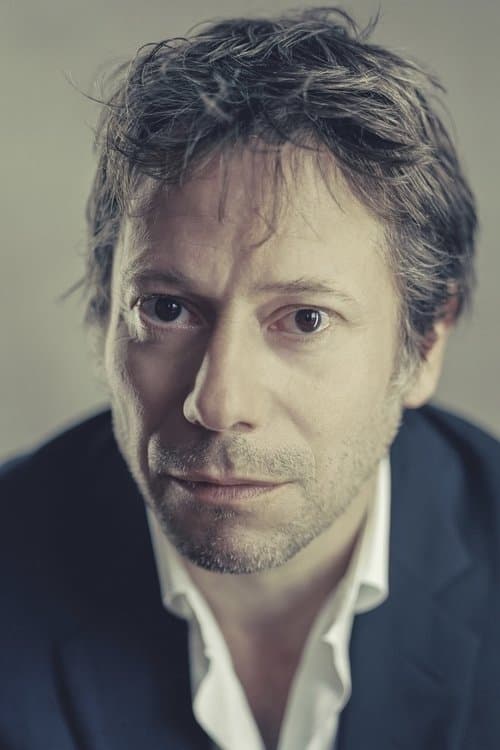 Mathieu Amalric as Henri Tomasi in A Difficult Year