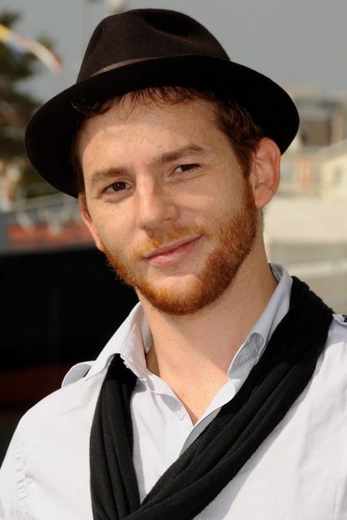 Malik Zidi as JP Perrot in Rebellion