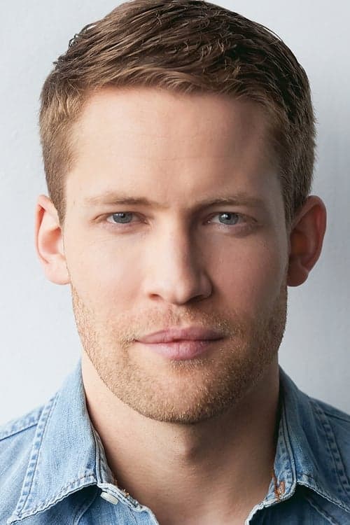 Jacob Blair as Travis in A Veteran's Christmas