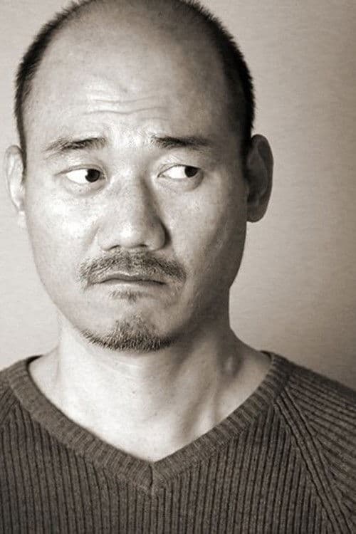 Kim Joon-bae as Franken in Open City