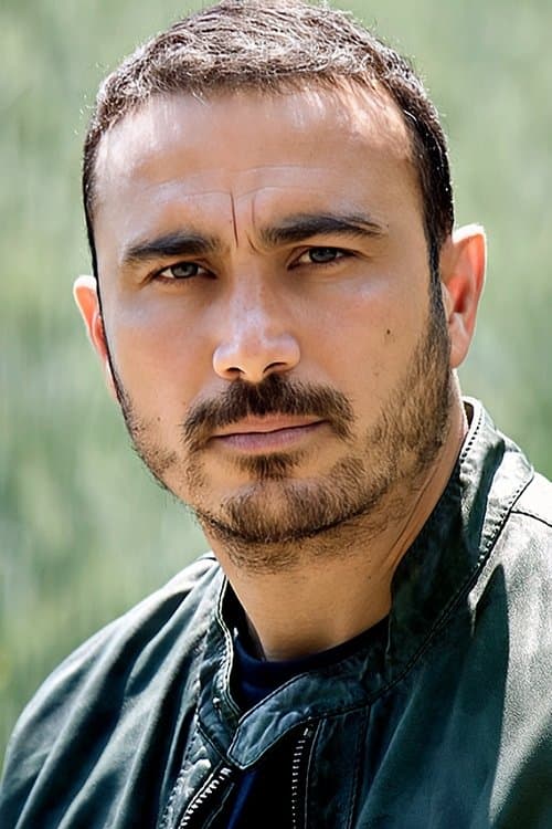 Francesco Di Leva as Dino Ruggeri in Last Night of Amore