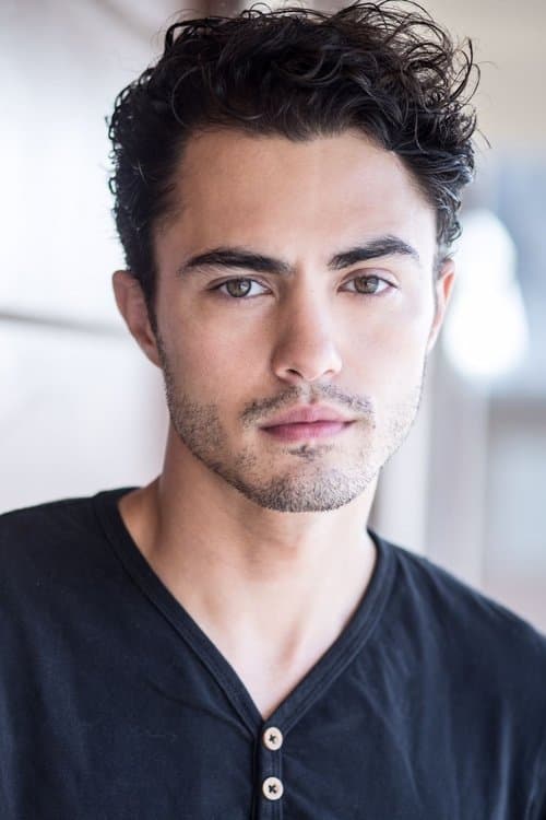 Darren Barnet as Tag in Love Hard